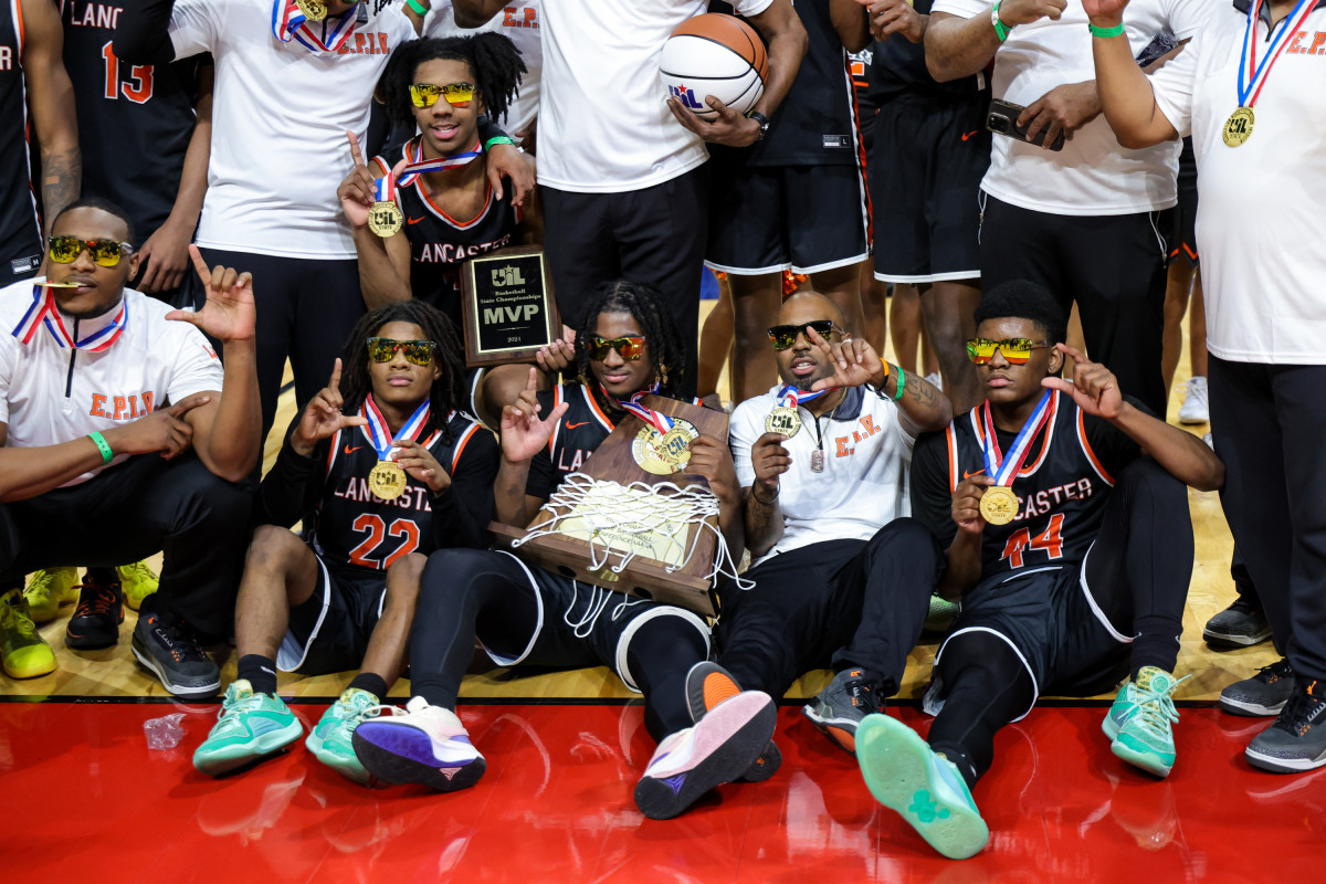 Lancaster players celebrate after winning the UIL Class 5A state championship on Saturday at the Alamodome.